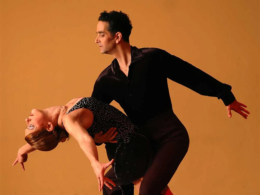 Couple dancing a Latin social dance